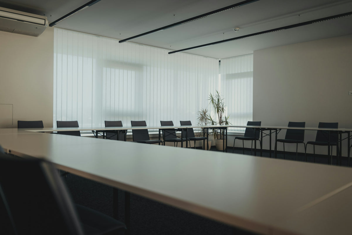 Boardroom with a long table and chairs